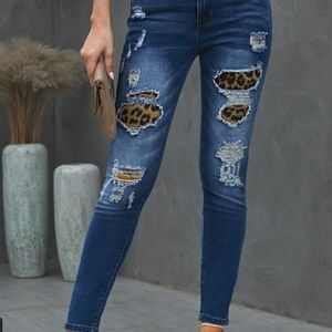 Distressed jeans with 🐆 inside-out patches 🔥 !